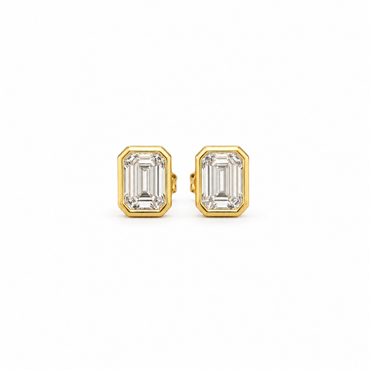 The Ray Emerald Bezeled Studs